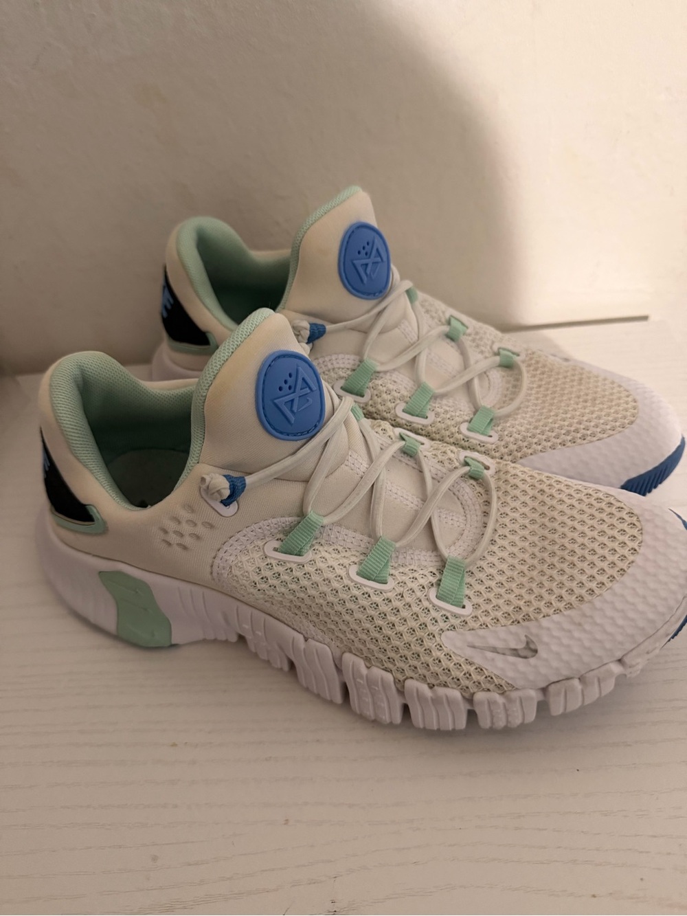 Nike Kids White Athletic Sneakers with Mint & Blue Accents